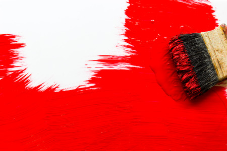 Convertible painted in red on a white background.の写真素材