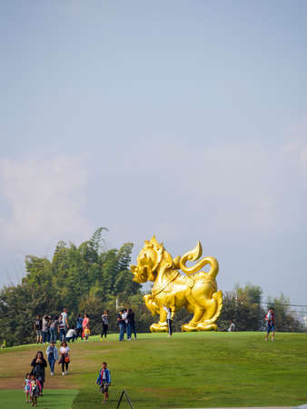 CHIANG RAI, THAILAND - JANUARY 13, 2018: Wide vertical detail of the famous Singha golden lion beer logo in front of the Boon Rawd Farm on a sunny day. Travel and tourism.のeditorial素材