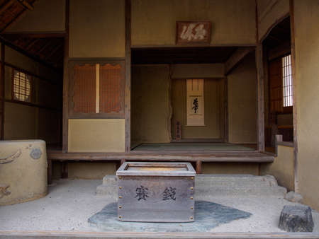 KYOTO, JAPAN - APRIL 2, 2018: Wide angle view of the Sekkatei teahouse interior, with Tatami floor mats and donation box. Kinkakujicho, Kita. Travel and tourism.のeditorial素材