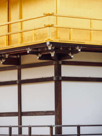 KYOTO, JAPAN - APRIL 2, 2018: Closeup detail of the gold-leafed paper walls on the floors of the Kinkakuji Golden-leaf Pavilion. Vertical orientation. Travel and landmarks.のeditorial素材