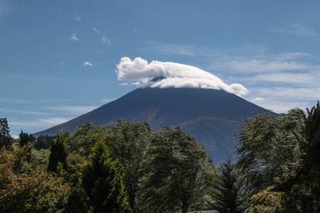 On a lucky day you can see a wonderful scene of Mountain Fuji. This scene there is a cloud on the top of Fuji which its shape look like a santa's hat.の写真素材
