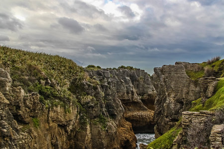 In South New Zealand the famous place where must to visit is Pancake Rock. This place has created wonderfully by nature and there are rocks that overlay on each of them to be looked like pancake.の写真素材
