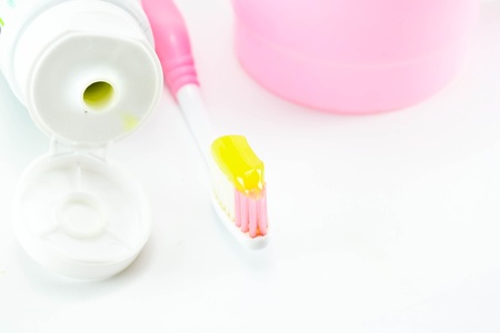 Toothbrush and toothpaste on white backgroundの写真素材