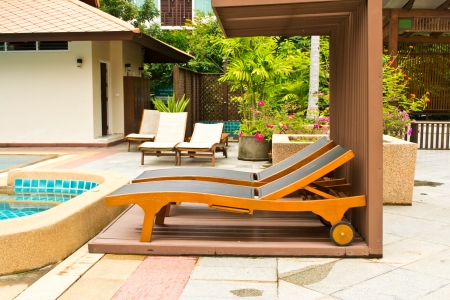 Long chairs by the poolのeditorial素材