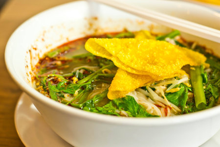 Place the noodles in a bowl on the table