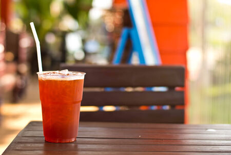 Lemon tea in plastic cups place on the tableの写真素材