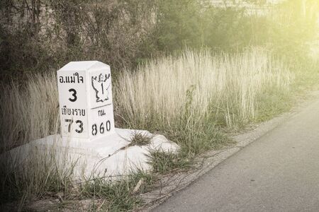 kilometer stone on the roadの写真素材