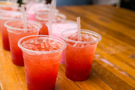 Soft drinks in plastic cups with Ice cool