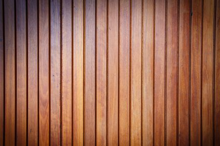 teak wood texture background with radial shadowの写真素材