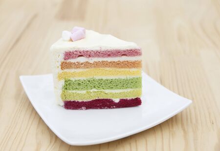 colorful rainbow cake top with marshmallowsの写真素材
