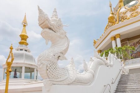 Thai dragon statue in thai temple right sideの写真素材