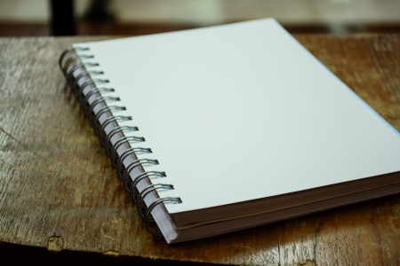 Notebook on deskの写真素材