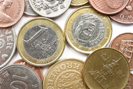 coin collection with old coins isolated on white backgroundのeditorial素材