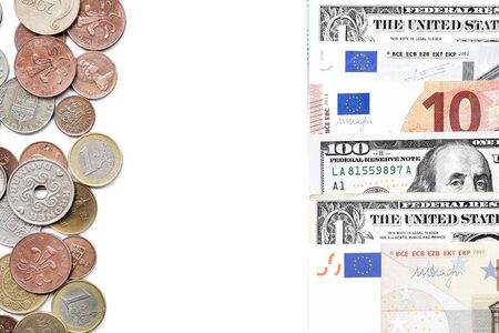 Euro and dollar bills with coins for backgroundの写真素材