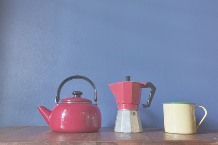 Retro zinc teapots on a wooden backgroundの写真素材