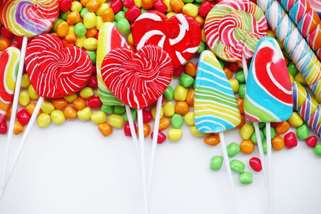 sweets and sugar candies colorful, handmade swirl lollipop for backgroundの写真素材