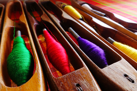 Colorful thread spools used in fabric and textile industry