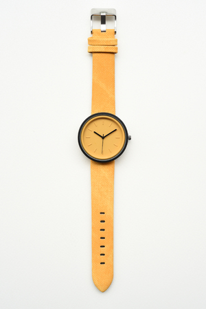 Yellow wristwatches isolated on white backgroundの写真素材