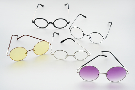 Modern fashionable sunglasses isolated on white backgroundの写真素材