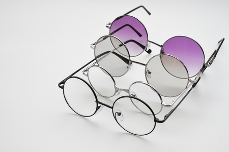 Modern fashionable sunglasses isolated on white backgroundの写真素材