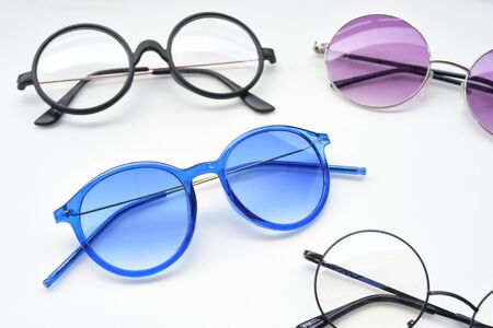 Modern fashionable sunglasses isolated on white backgroundの写真素材