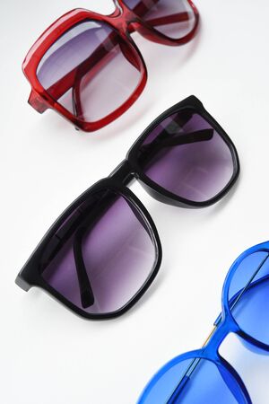 Modern fashionable sunglasses isolated on white backgroundの写真素材