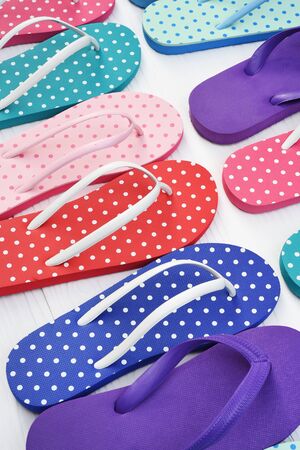 colorful sandals isolated on white backgroundの写真素材
