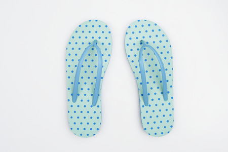 blue sandals isolated on white backgroundの写真素材
