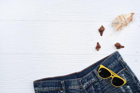 jeans texture and sandals with accessories on white backgroundの写真素材