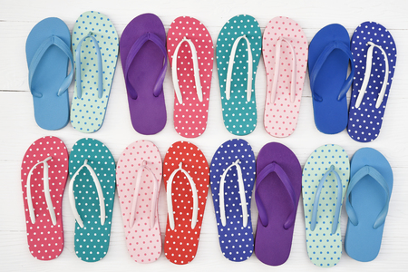 colorful sandals isolated on white backgroundの写真素材