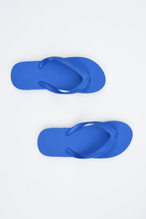 blue sandals isolated on white backgroundの写真素材