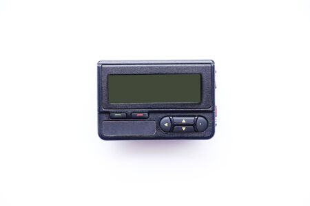 Old beeper or pager isolated on white backgroundの写真素材