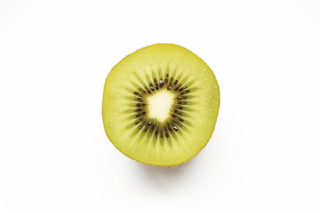 Close up of fresh kiwi fruit isolated on white backgroundの写真素材