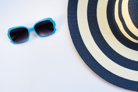 Summer hat and sunglasses isolated on white backgroundの写真素材