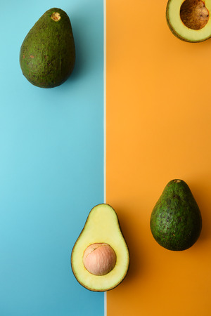 close up of avocado sliced in half for background