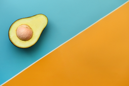 close up of avocado sliced in half for background