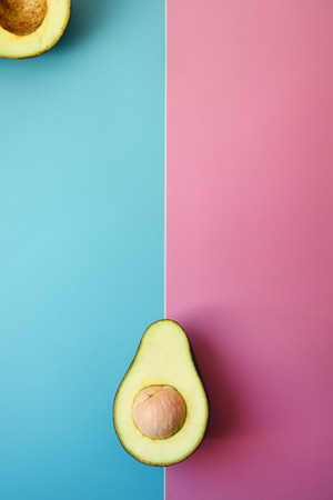 close up of avocado sliced in half for background