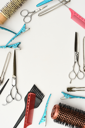 Set of professional hairdresser tools isolated on white backgroundの写真素材
