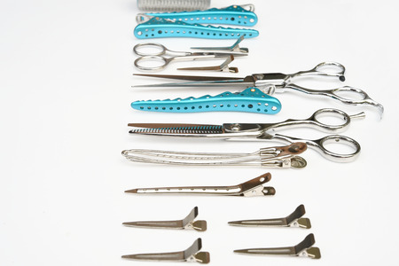 Set of professional hairdresser tools isolated on white background