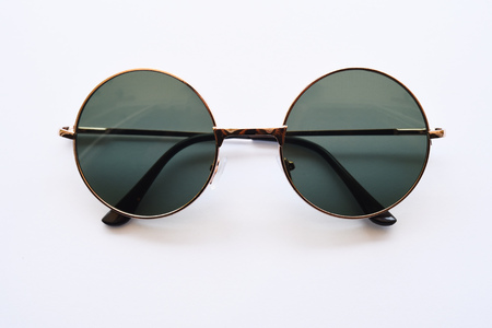 Modern fashionable sunglasses isolated on white background