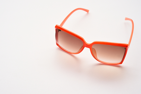 Modern fashionable sunglasses isolated on white backgroundの写真素材