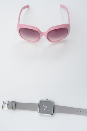 close up of wristwatches with sunglasses for backgroundの写真素材
