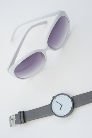 close up of wristwatches with sunglasses for backgroundの写真素材