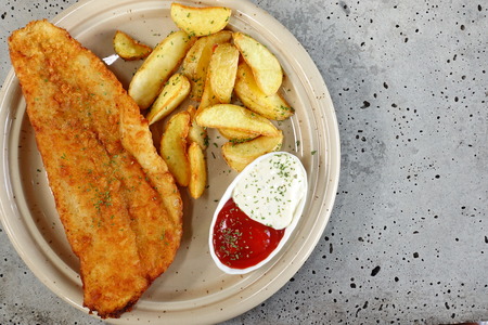 Fish and chips on a plateの写真素材