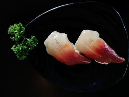 Closeup of fresh sushi on on ceramic dish, Japanese foodの写真素材