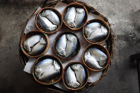 Thai mackerel fish steamed in bamboo basketの写真素材