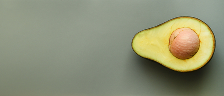 close up of avocado sliced in half for backgroundの写真素材