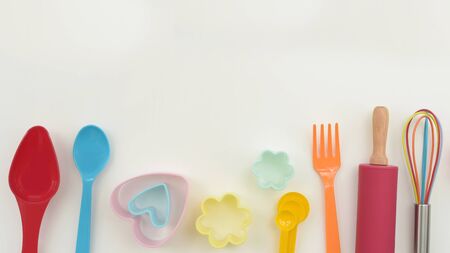 close up of baking utensils tools and cooking concept isolated on white backgroundの写真素材