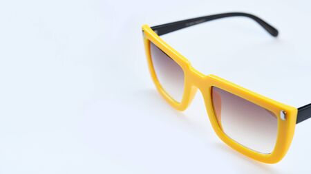 Modern fashionable sunglasses isolated on white backgroundの写真素材