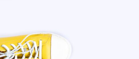 close up of yellow shoes isolated on white backgroundの写真素材